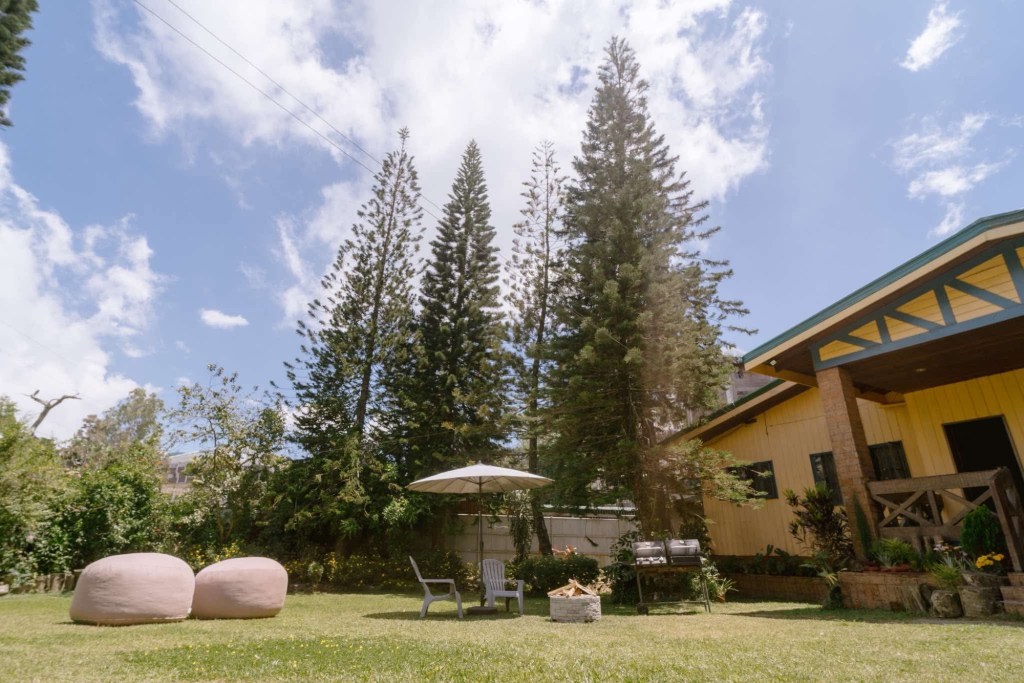 Barn style mountain lodge garden wedding venue in Baguio with backyard outdoor ceremony and reception venue, including accommodation by Shabby Chic Style Studio.